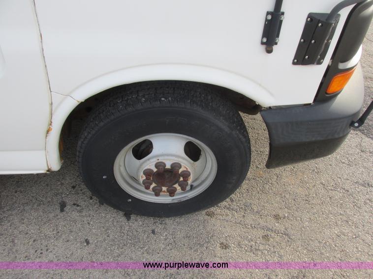 image for item J2358 2004 GMC Savana Thomas Built bus