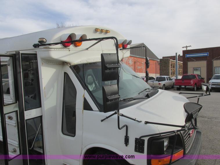 image for item J2358 2004 GMC Savana Thomas Built bus