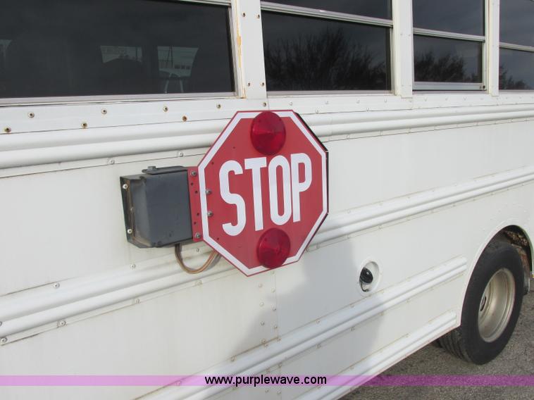 image for item J2358 2004 GMC Savana Thomas Built bus