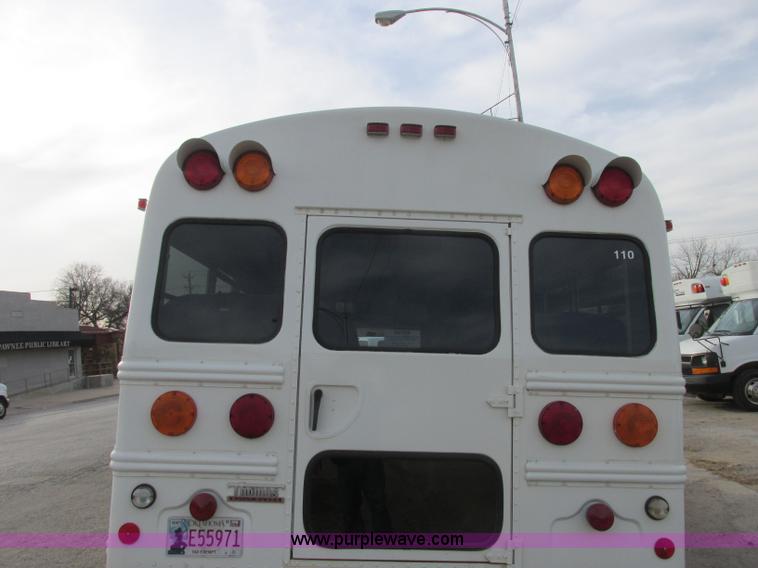 image for item J2358 2004 GMC Savana Thomas Built bus