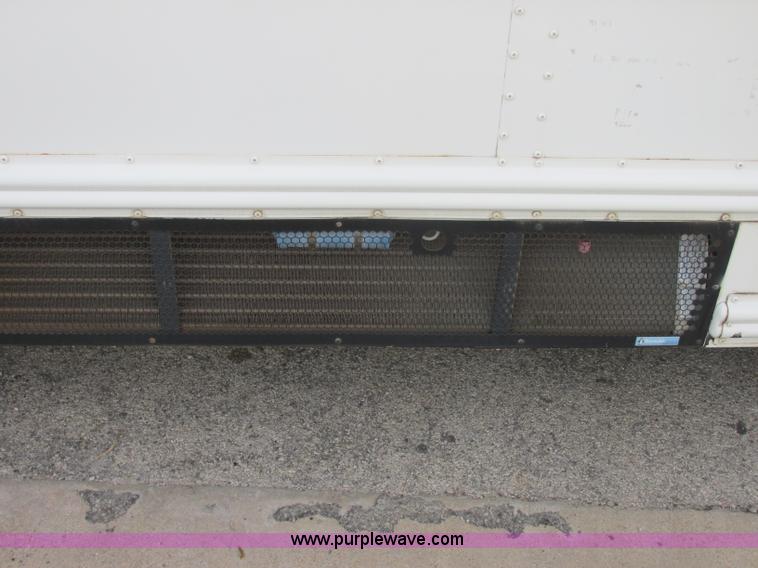 image for item J2358 2004 GMC Savana Thomas Built bus