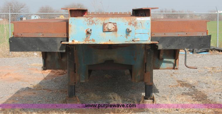 image for item AK9628 1976 Fruehauf triple axle step deck trailer