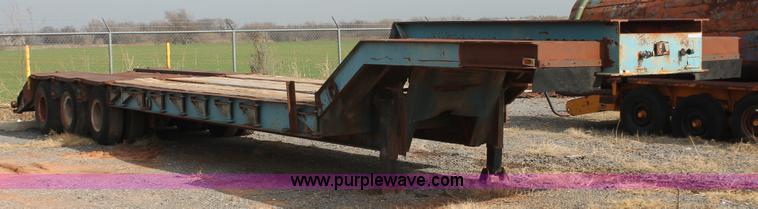 image for item AK9628 1976 Fruehauf triple axle step deck trailer