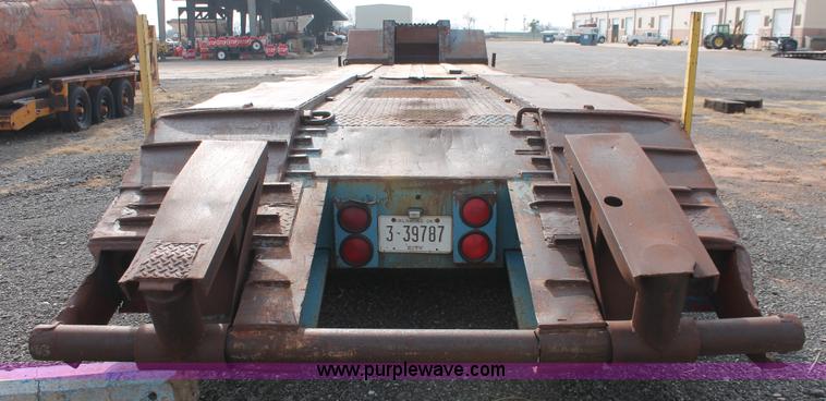 image for item AK9628 1976 Fruehauf triple axle step deck trailer