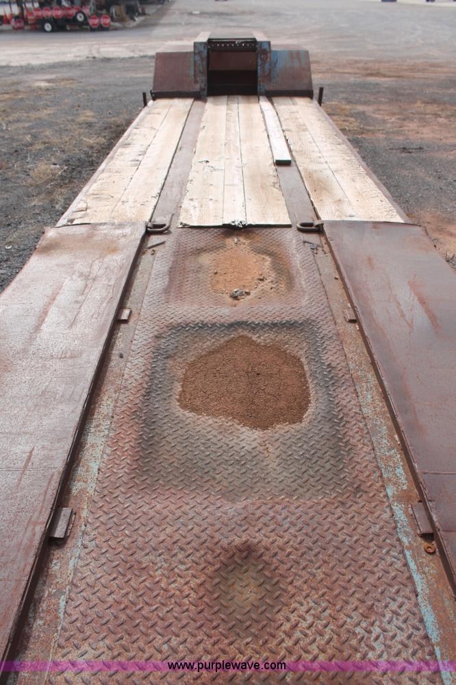 image for item AK9628 1976 Fruehauf triple axle step deck trailer