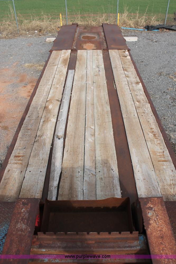 image for item AK9628 1976 Fruehauf triple axle step deck trailer