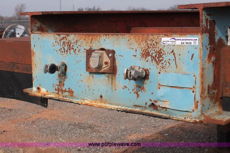 image for item AK9628 1976 Fruehauf triple axle step deck trailer