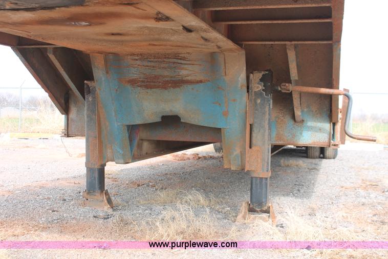 image for item AK9628 1976 Fruehauf triple axle step deck trailer