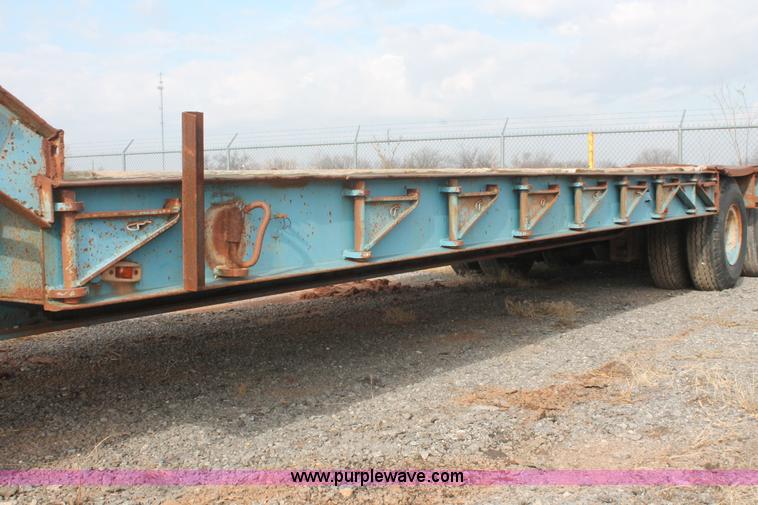 image for item AK9628 1976 Fruehauf triple axle step deck trailer