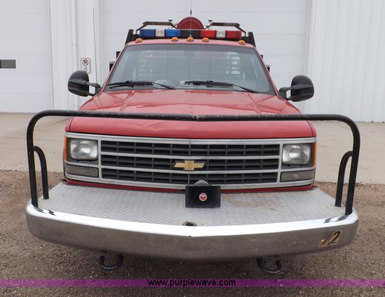 image for item K3046 1991 Chevrolet Cheyenne 3500 flatbed fire truck