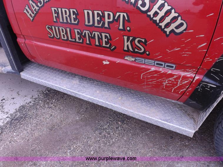 image for item K3046 1991 Chevrolet Cheyenne 3500 flatbed fire truck