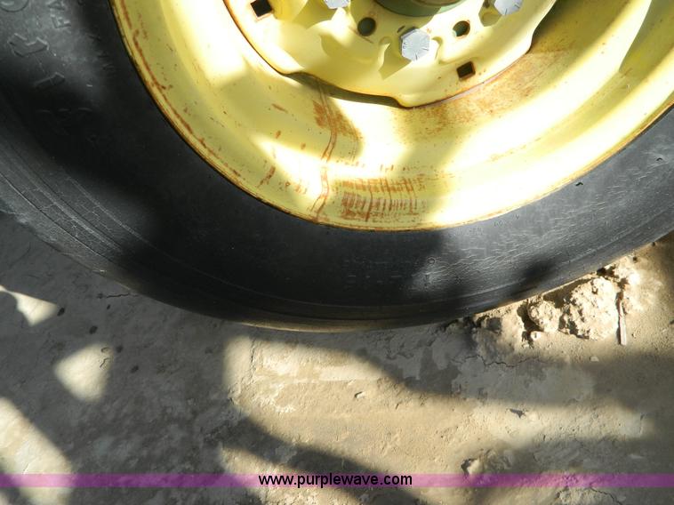 image for item H2291 John Deere 320 30' off-set disk