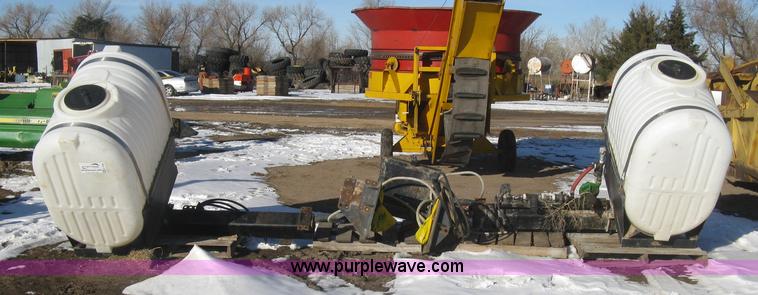 image for item K2768 (2) poly tractor mounted saddle tanks