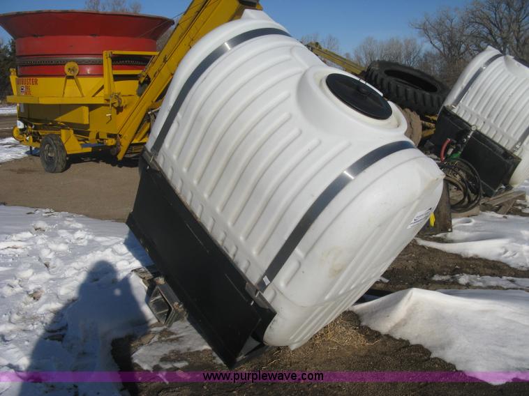 image for item K2768 (2) poly tractor mounted saddle tanks