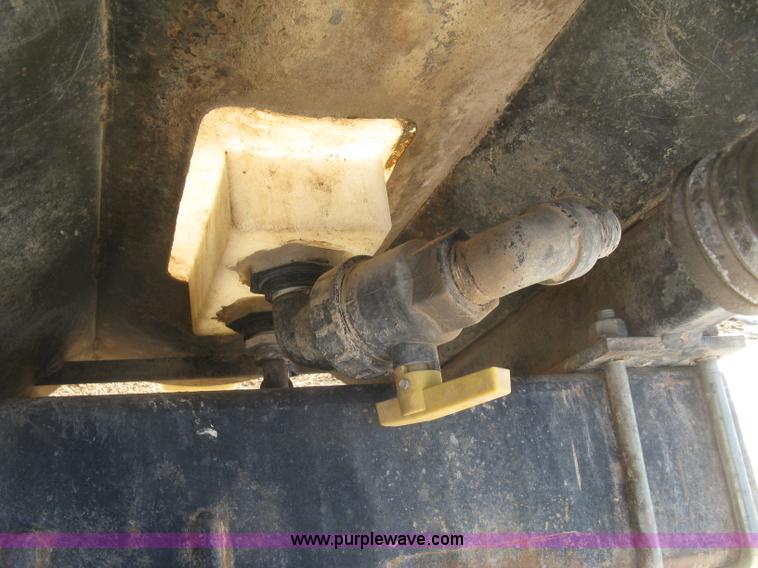 image for item K2768 (2) poly tractor mounted saddle tanks