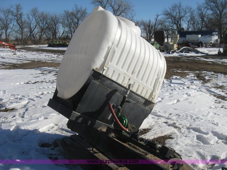 image for item K2768 (2) poly tractor mounted saddle tanks