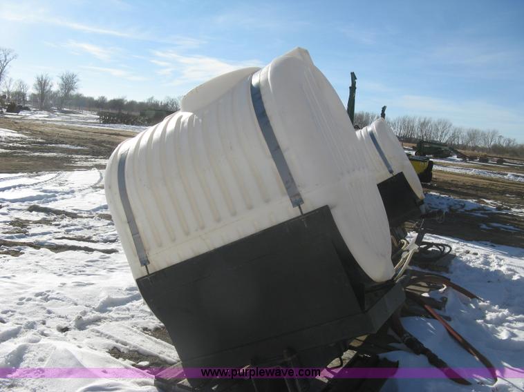 image for item K2768 (2) poly tractor mounted saddle tanks
