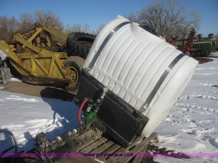 image for item K2768 (2) poly tractor mounted saddle tanks