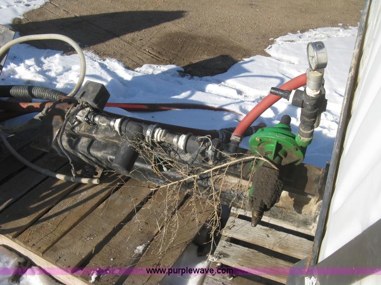 image for item K2768 (2) poly tractor mounted saddle tanks