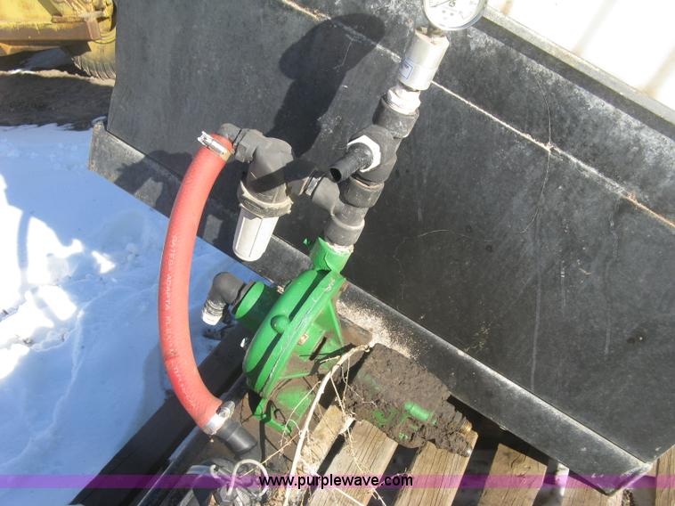 image for item K2768 (2) poly tractor mounted saddle tanks