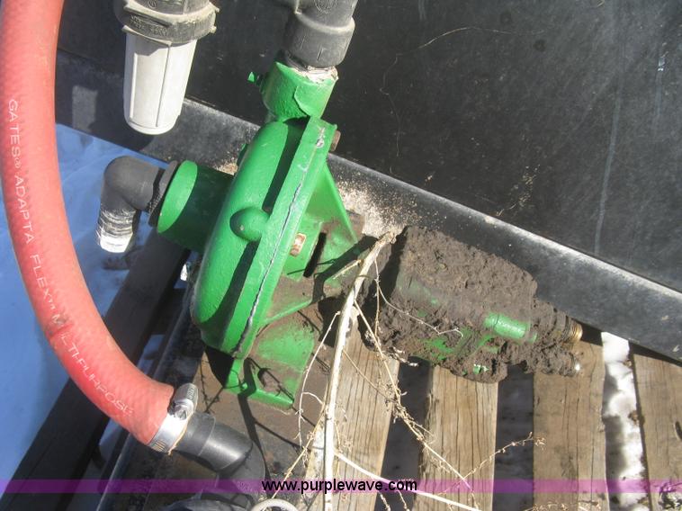 image for item K2768 (2) poly tractor mounted saddle tanks