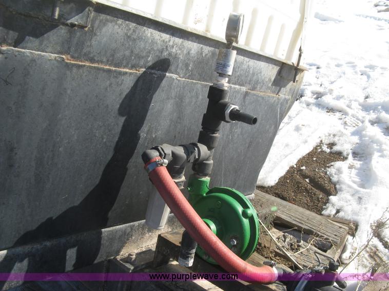 image for item K2768 (2) poly tractor mounted saddle tanks