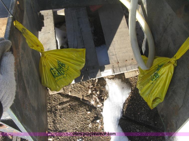 image for item K2768 (2) poly tractor mounted saddle tanks