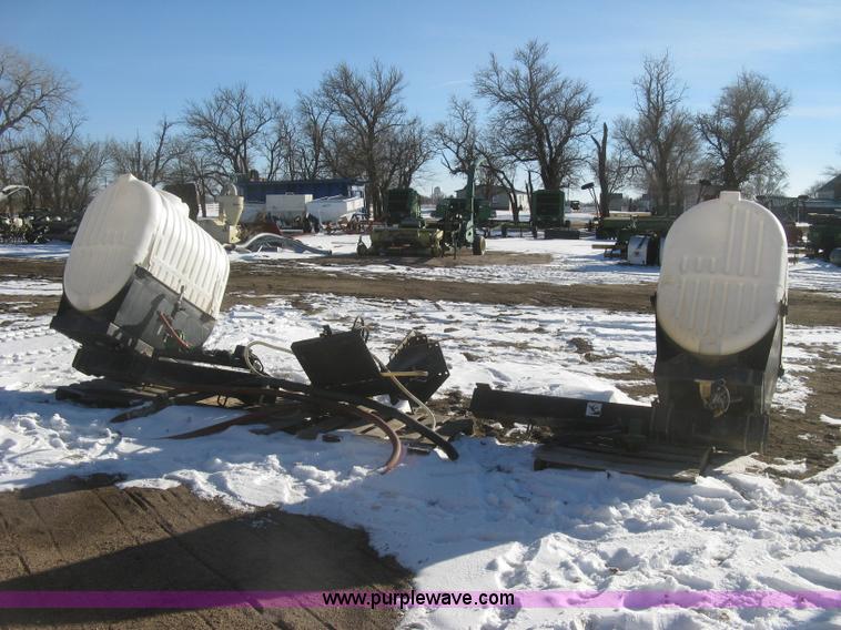 image for item K2768 (2) poly tractor mounted saddle tanks