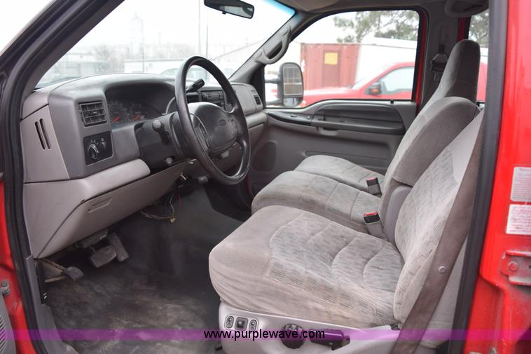 image for item I8591 1999 Ford F550 Super Duty XLT Crew Cab flatbed truck