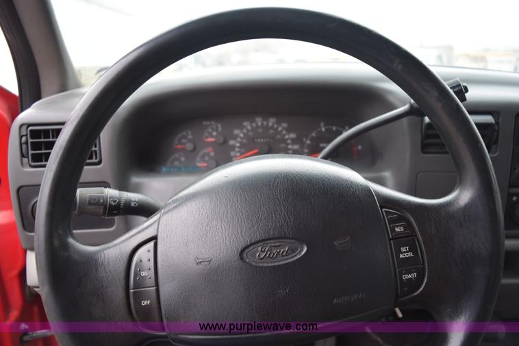 image for item I8591 1999 Ford F550 Super Duty XLT Crew Cab flatbed truck