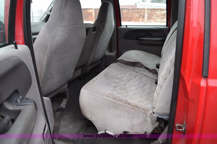 image for item I8591 1999 Ford F550 Super Duty XLT Crew Cab flatbed truck