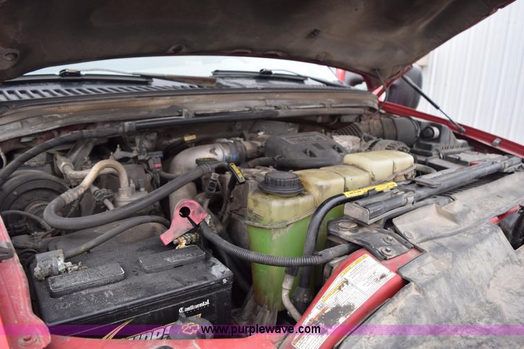 image for item I8591 1999 Ford F550 Super Duty XLT Crew Cab flatbed truck