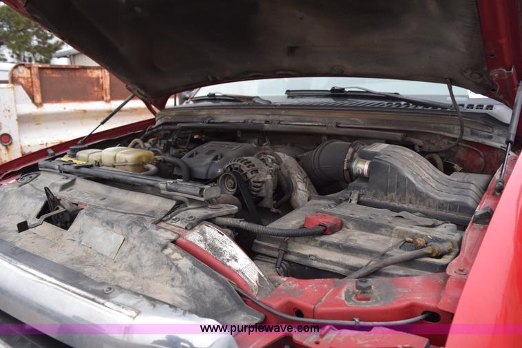 image for item I8591 1999 Ford F550 Super Duty XLT Crew Cab flatbed truck