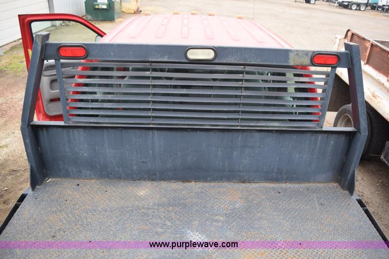 image for item I8591 1999 Ford F550 Super Duty XLT Crew Cab flatbed truck