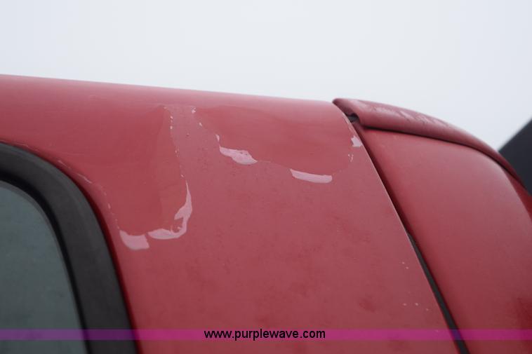 image for item I8591 1999 Ford F550 Super Duty XLT Crew Cab flatbed truck