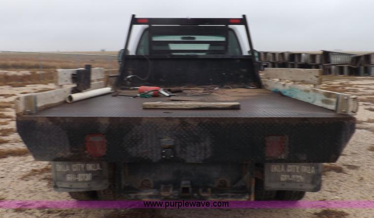 image for item K3081 2007 Ford F350 Super Duty XL flatbed pickup truck