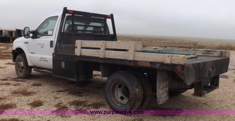 image for item K3081 2007 Ford F350 Super Duty XL flatbed pickup truck