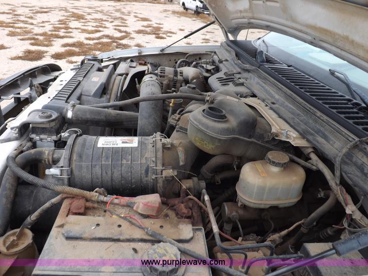 image for item K3081 2007 Ford F350 Super Duty XL flatbed pickup truck