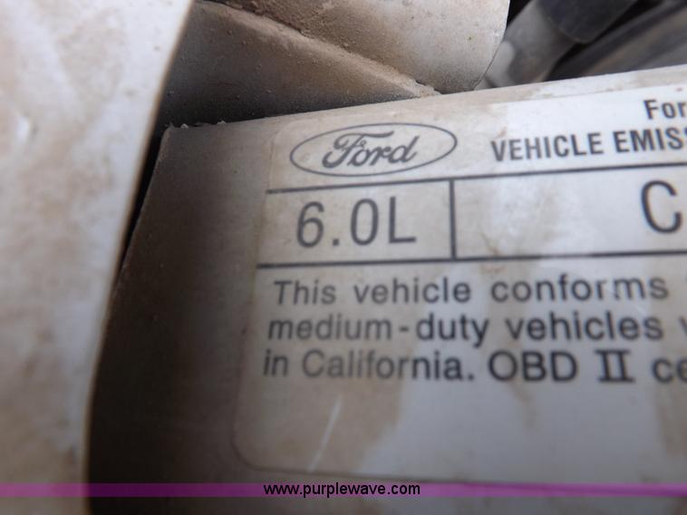 image for item K3081 2007 Ford F350 Super Duty XL flatbed pickup truck