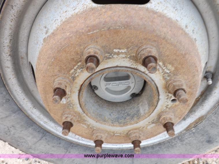 image for item K3081 2007 Ford F350 Super Duty XL flatbed pickup truck