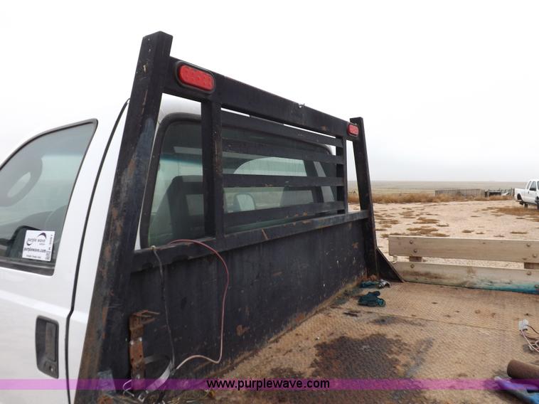 image for item K3081 2007 Ford F350 Super Duty XL flatbed pickup truck