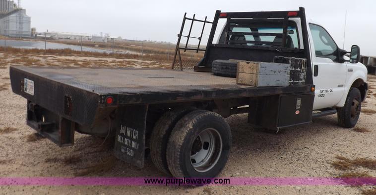 image for item K3082 2007 Ford F350 Super Duty XL flatbed pickup truck