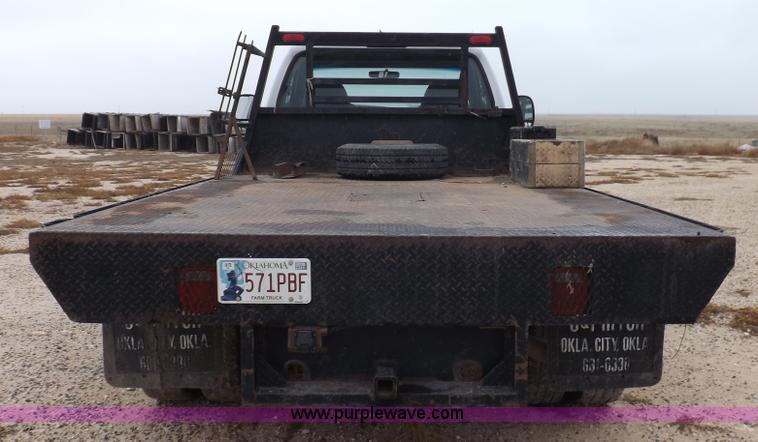 image for item K3082 2007 Ford F350 Super Duty XL flatbed pickup truck