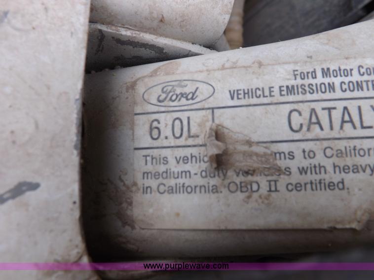 image for item K3082 2007 Ford F350 Super Duty XL flatbed pickup truck