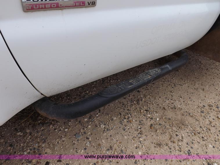 image for item K3082 2007 Ford F350 Super Duty XL flatbed pickup truck