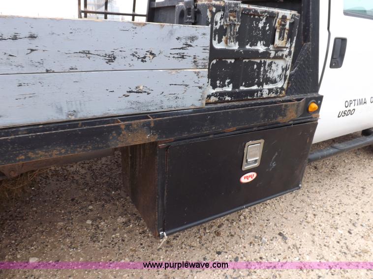 image for item K3082 2007 Ford F350 Super Duty XL flatbed pickup truck