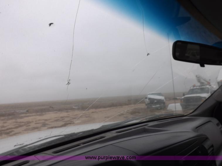 image for item K3082 2007 Ford F350 Super Duty XL flatbed pickup truck