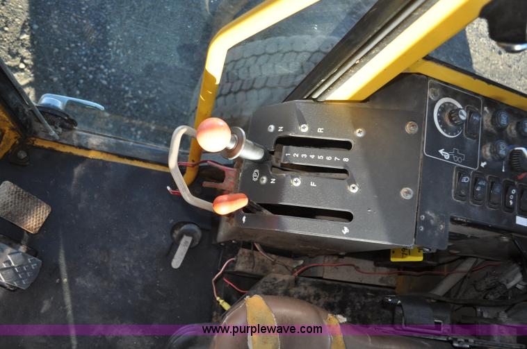 image for item F2174 1999 John Deere 772CH articulated motor grader