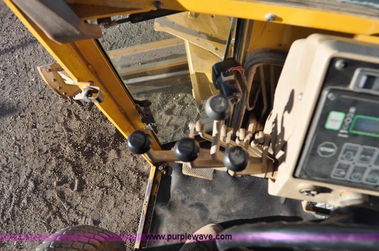 image for item F2174 1999 John Deere 772CH articulated motor grader