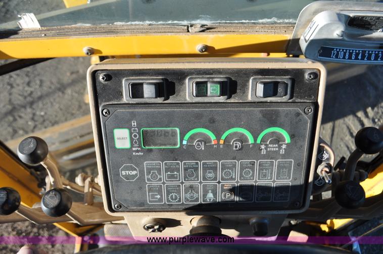 image for item F2174 1999 John Deere 772CH articulated motor grader